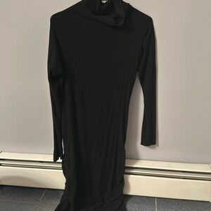 Midi black dress, form fitting, rouched sides. Anthropologie.